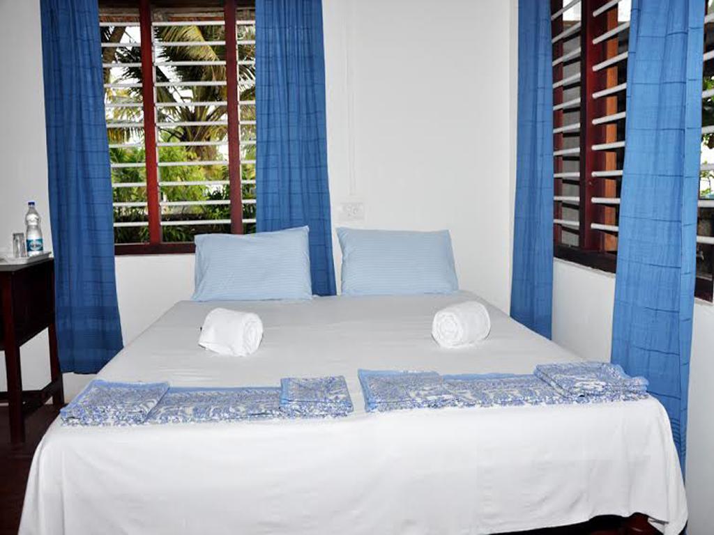 Angeo Beach House Alappuzha Habitación foto